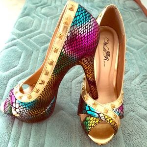 High heel shoes - worn once. Has sticker on bottom